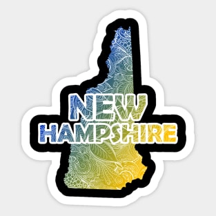 Colorful mandala art map of New Hampshire with text in blue and yellow Sticker